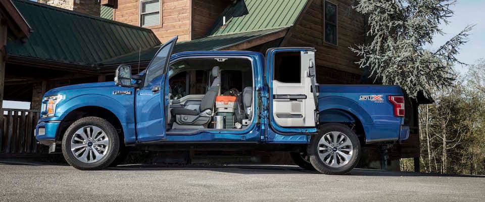 2019 Ford F-150 A blue 2019 Ford F-150 with the doors open