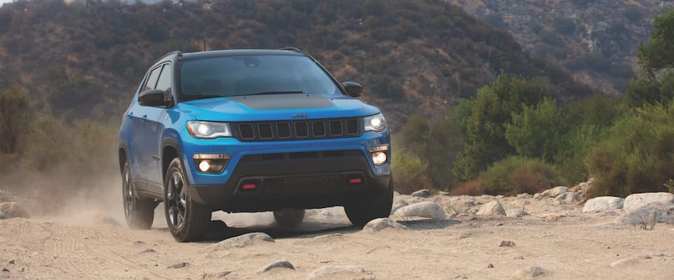 2019 Jeep Compass A blue 2019 Jeep Compass offroading in a desert