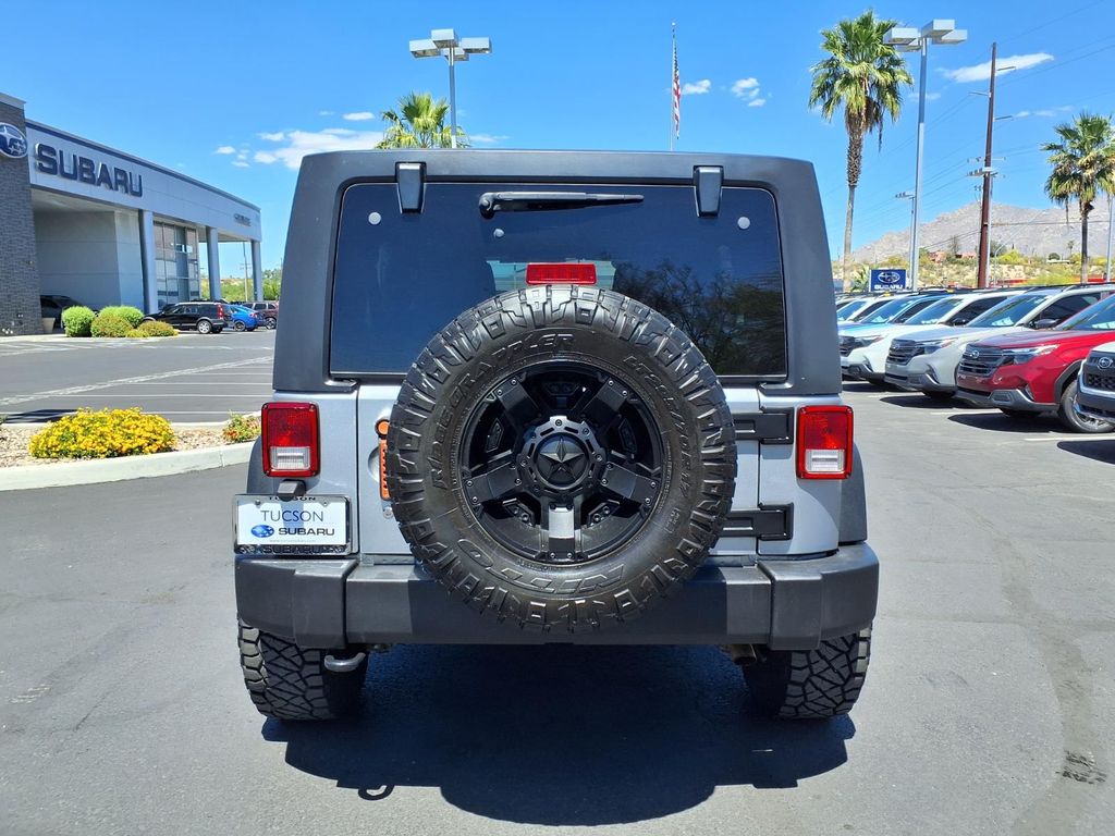 used 2016 Jeep Wrangler JK Unlimited car, priced at $15,000