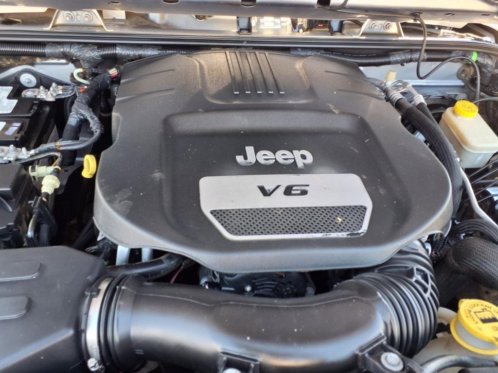 used 2016 Jeep Wrangler JK Unlimited car, priced at $15,000