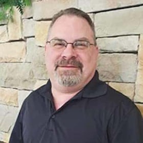 Staff member John Baker from ID_09d7e5