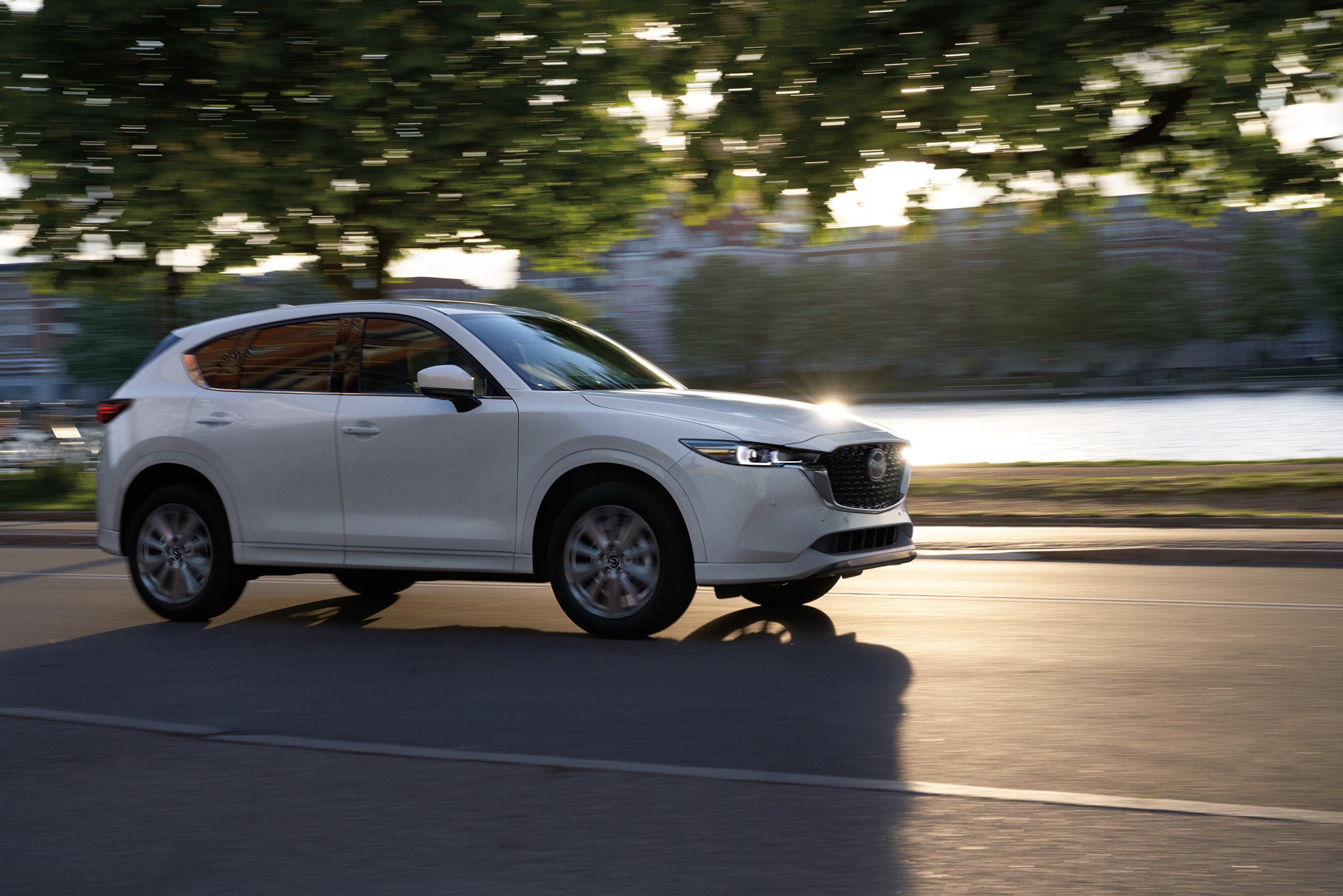 2023-Mazda-CX-5-Side-Driving.jpg