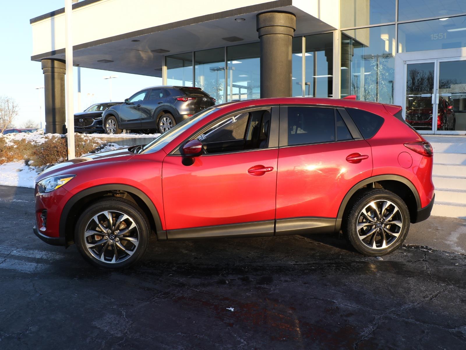 Used 2016 Mazda CX-5 Grand Touring with VIN JM3KE2DY9G0771354 for sale in Kansas City