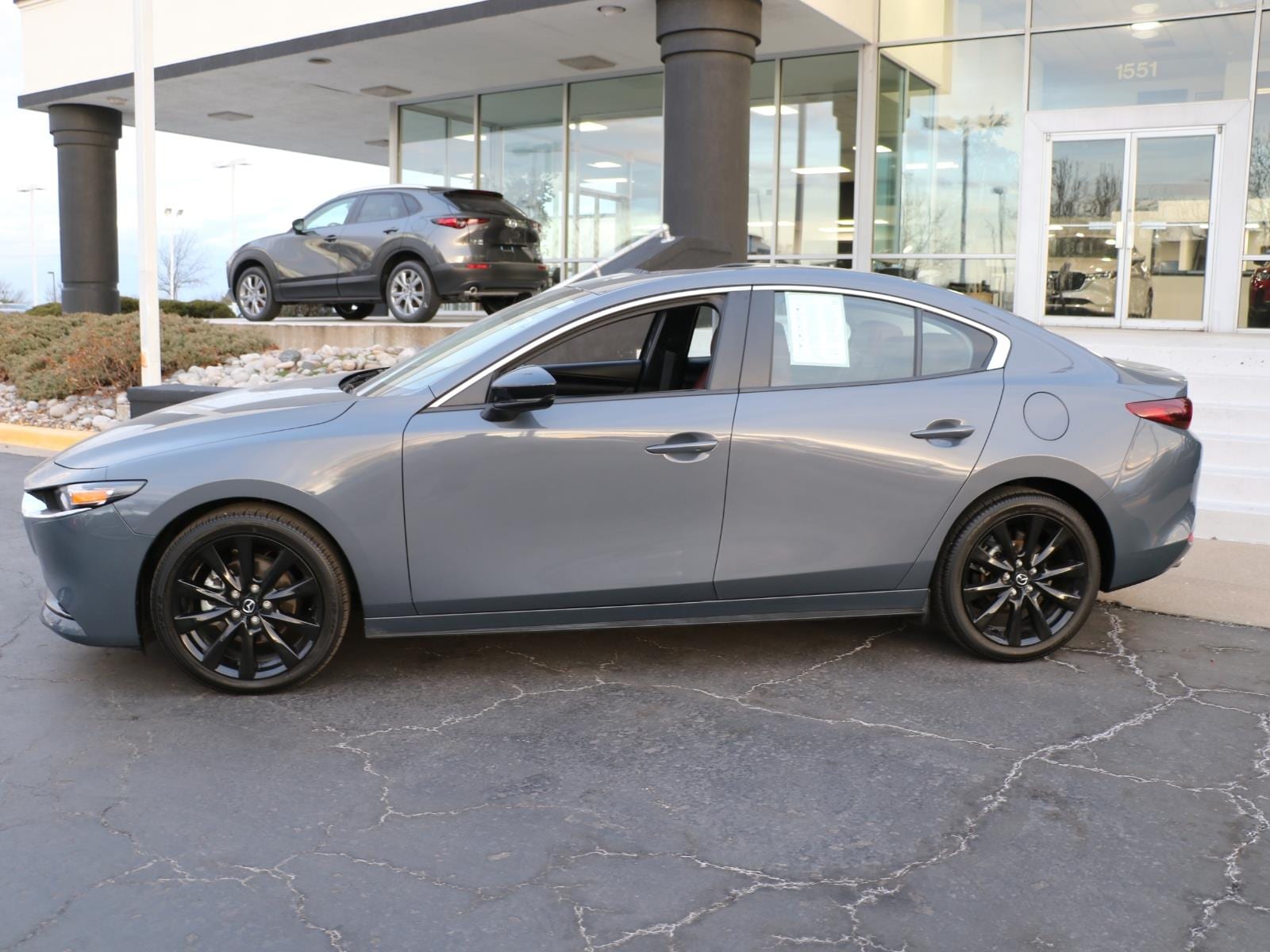 Certified 2025 Mazda Mazda3 Carbon Edition with VIN JM1BPBCM2S1775010 for sale in Kansas City