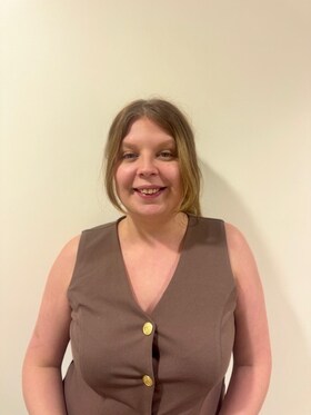 Staff member Regan Adams from 5ac2e7d4b574