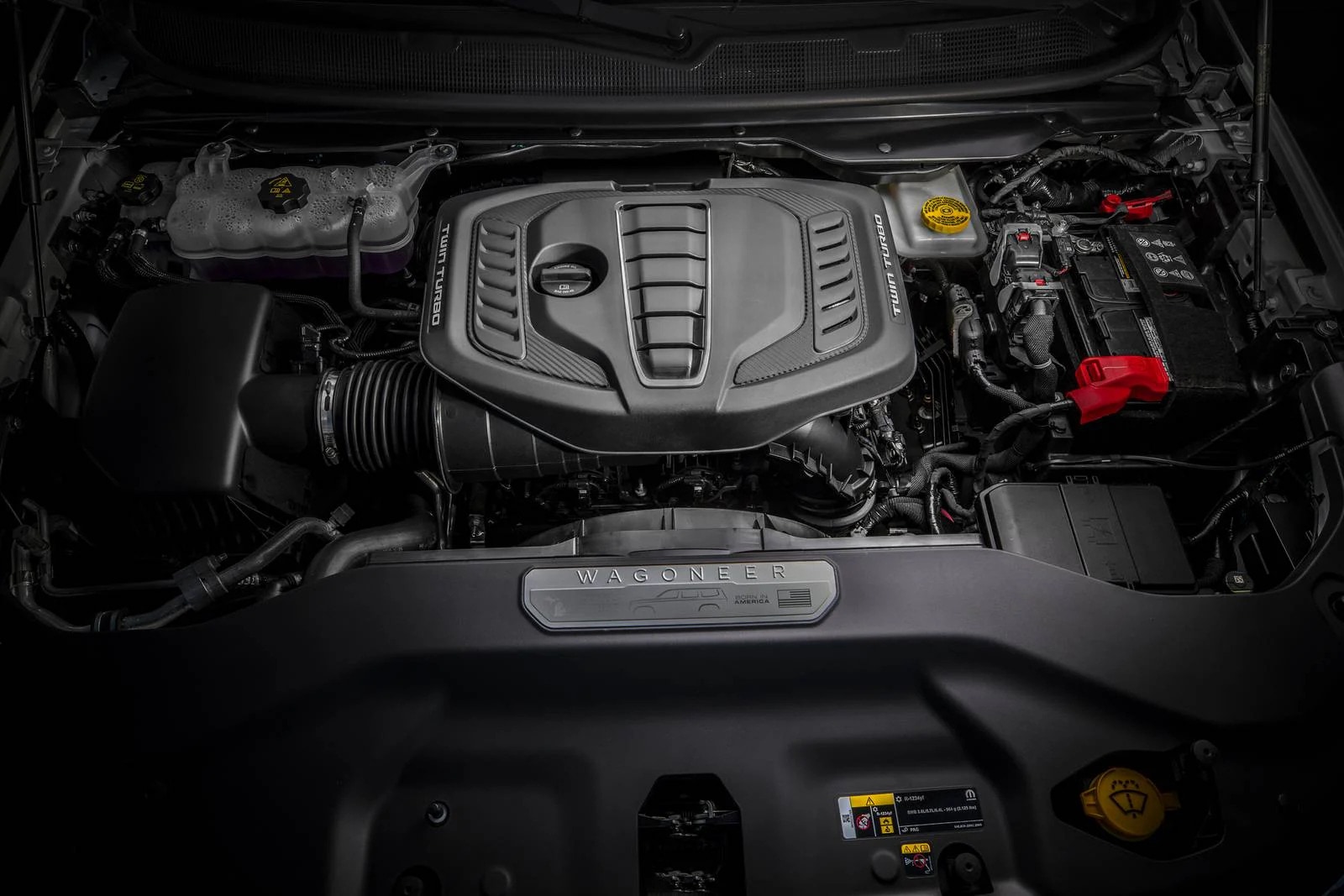 The engine of a jeep grand wagoneer.