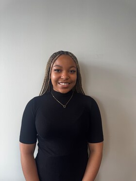 Staff member Kayla Stephens from 821a0dd942c7