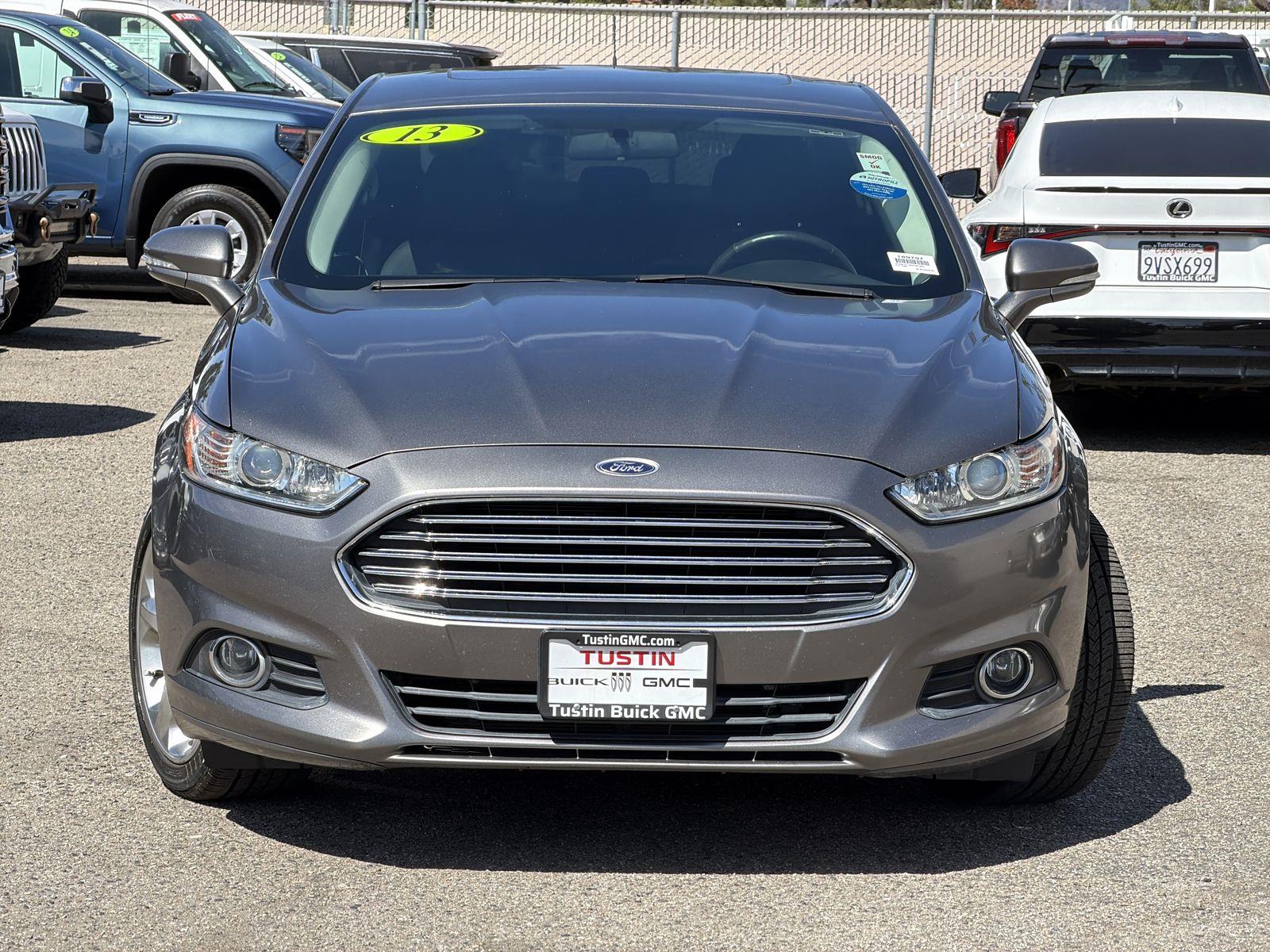 Used 2013 Ford Fusion SE Hybrid with VIN 3FA6P0LU8DR267600 for sale in Tustin, CA