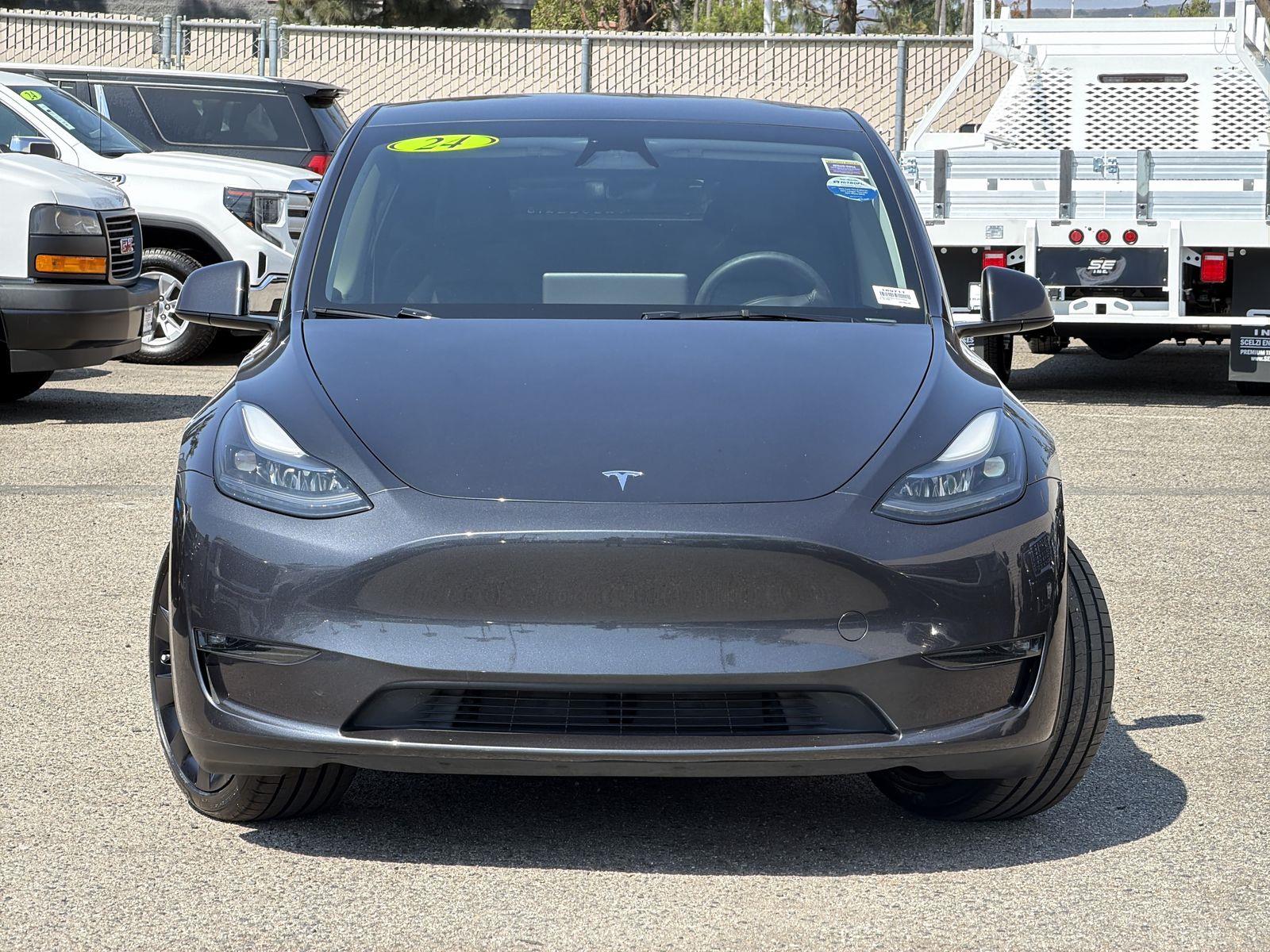 Used 2024 Tesla Model Y Long Range with VIN 7SAYGDEEXRA228550 for sale in Tustin, CA