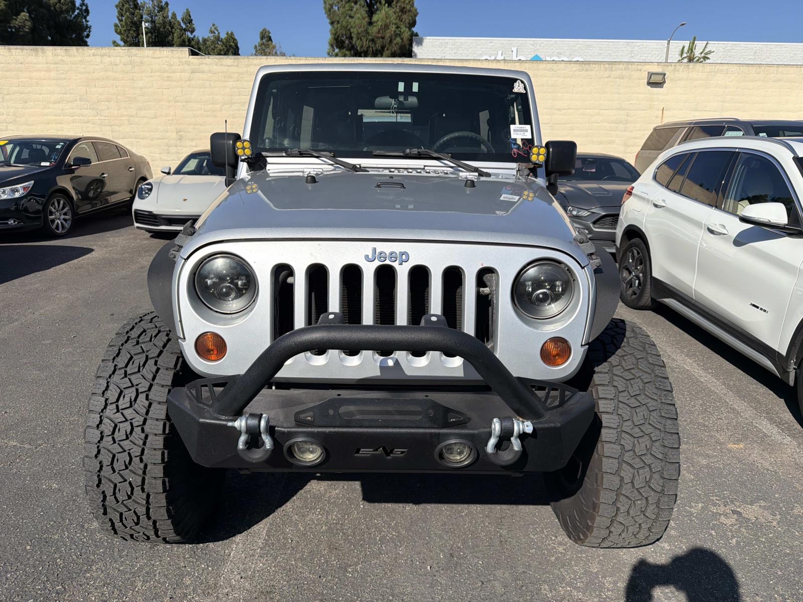 Used 2010 Jeep Wrangler Unlimited Sport with VIN 1J4BA3H11AL122008 for sale in Tustin, CA