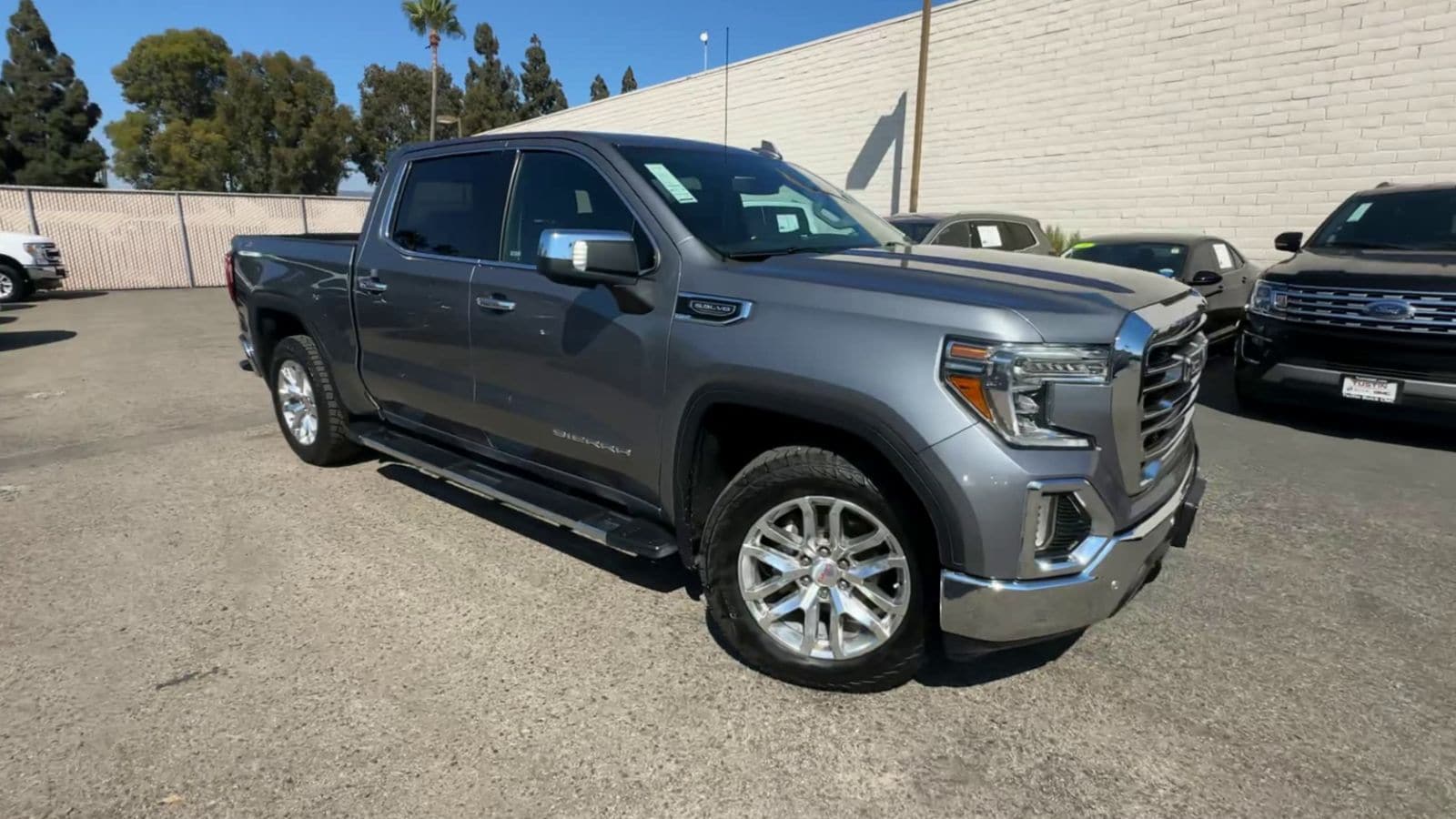 Used 2019 GMC Sierra 1500 SLT with VIN 3GTU9DED0KG306320 for sale in Tustin, CA