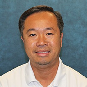 Staff member Chi Lim from ID_63b2fbcdbd94