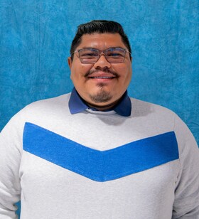 Staff member Carlos Perez from ID_63b2fbcdbd94