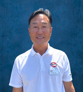 Staff member Mike Nam from ID_63b2fbcdbd94
