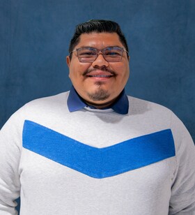 Staff member Carlos Perez from ID_63b2fbcdbd94