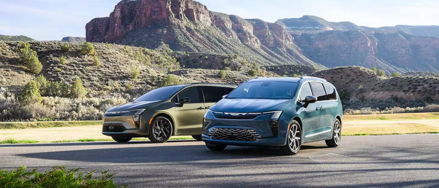 2027 Chrysler Pacifica Exterior Pair Parked In Mountains