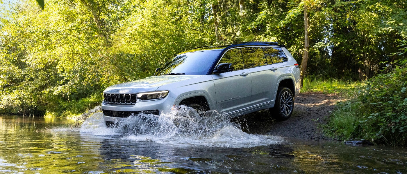 2026 Jeep Cherokee Exterior Crossing Forest Stream