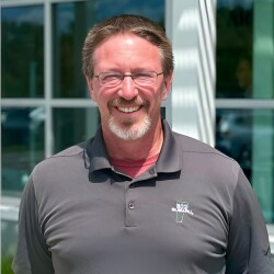 Staff member Jim Glassford from ID_b86cdd5f4c55