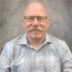 Staff member Christopher Grate from ID_28c2bbe4434c