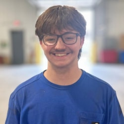 Staff member Garrett Miller from ID_28c2bbe4434c