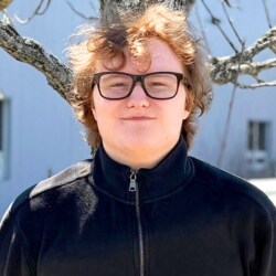 Staff member Cooper Farnham from ID_28c2bbe4434c