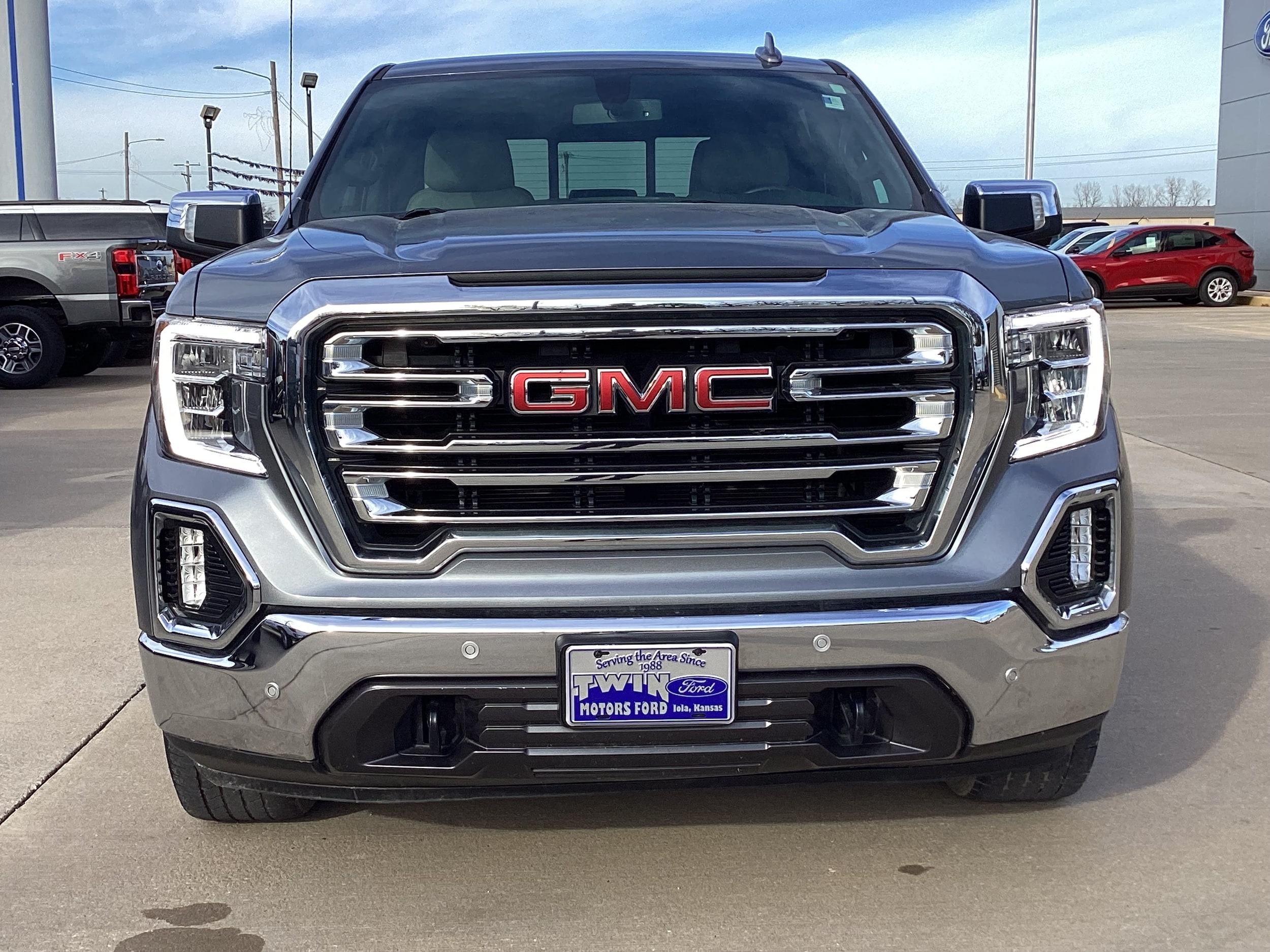 Used 2021 GMC Sierra 1500 SLT with VIN 1GTU9DED3MZ238016 for sale in Kansas City