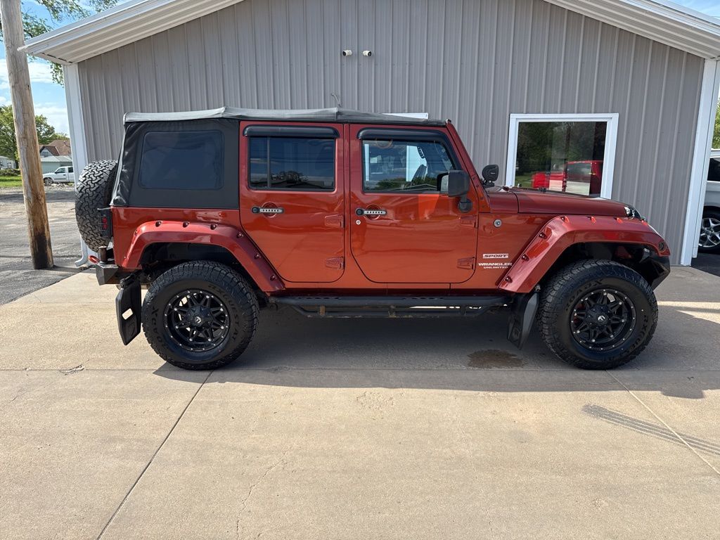Used 2014 Jeep Wrangler Unlimited Sport with VIN 1C4HJWDG2EL235466 for sale in Beatrice, NE