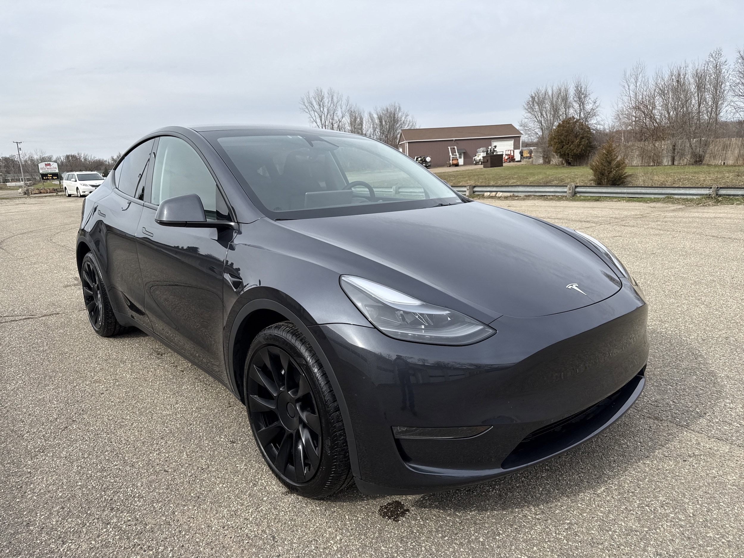 Used 2024 Tesla Model Y Long Range with VIN 7SAYGDEE1RA242711 for sale in Wayland, MI