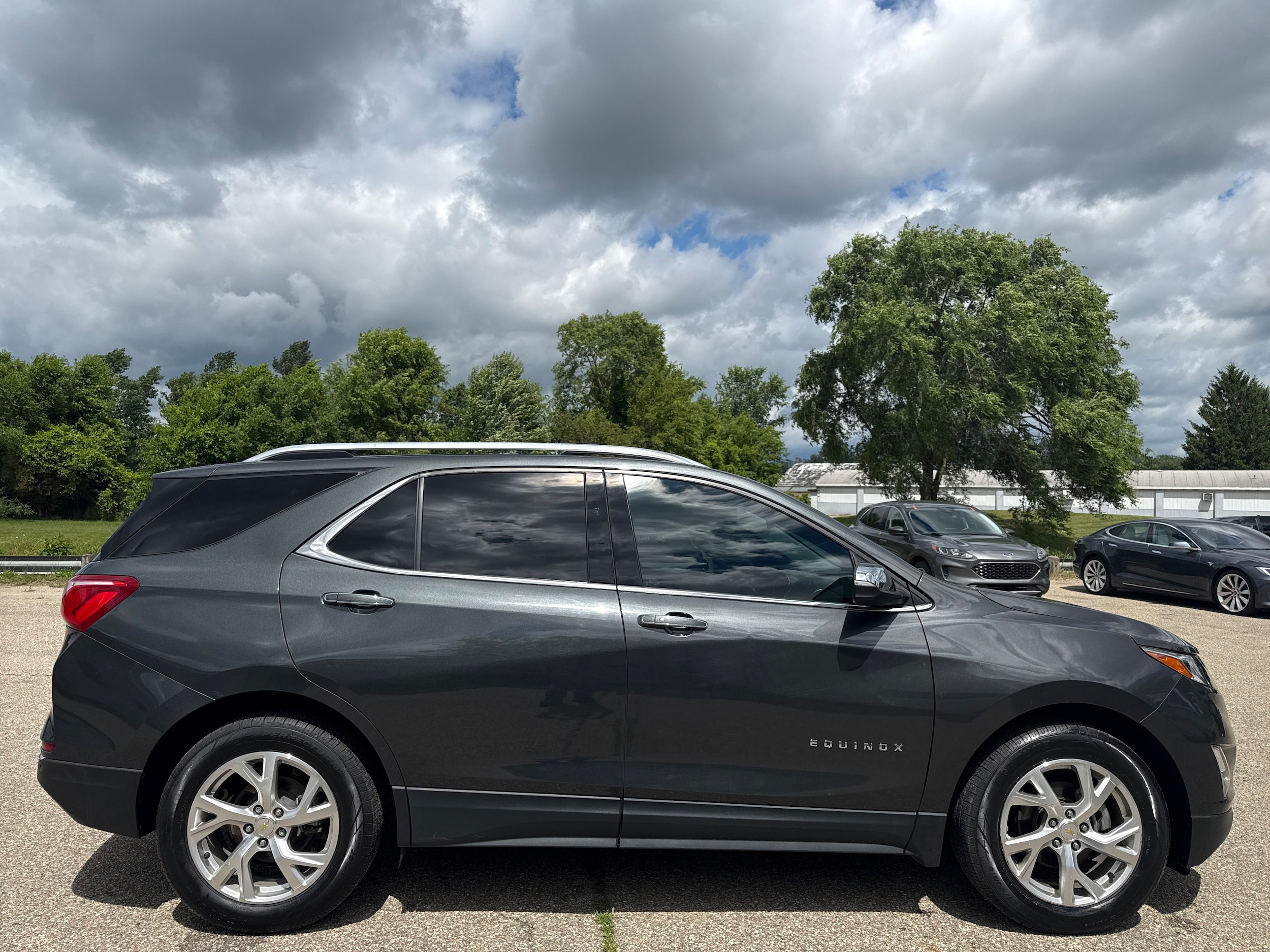 Used 2021 Chevrolet Equinox Premier with VIN 2GNAXNEV6M6104255 for sale in Wayland, MI