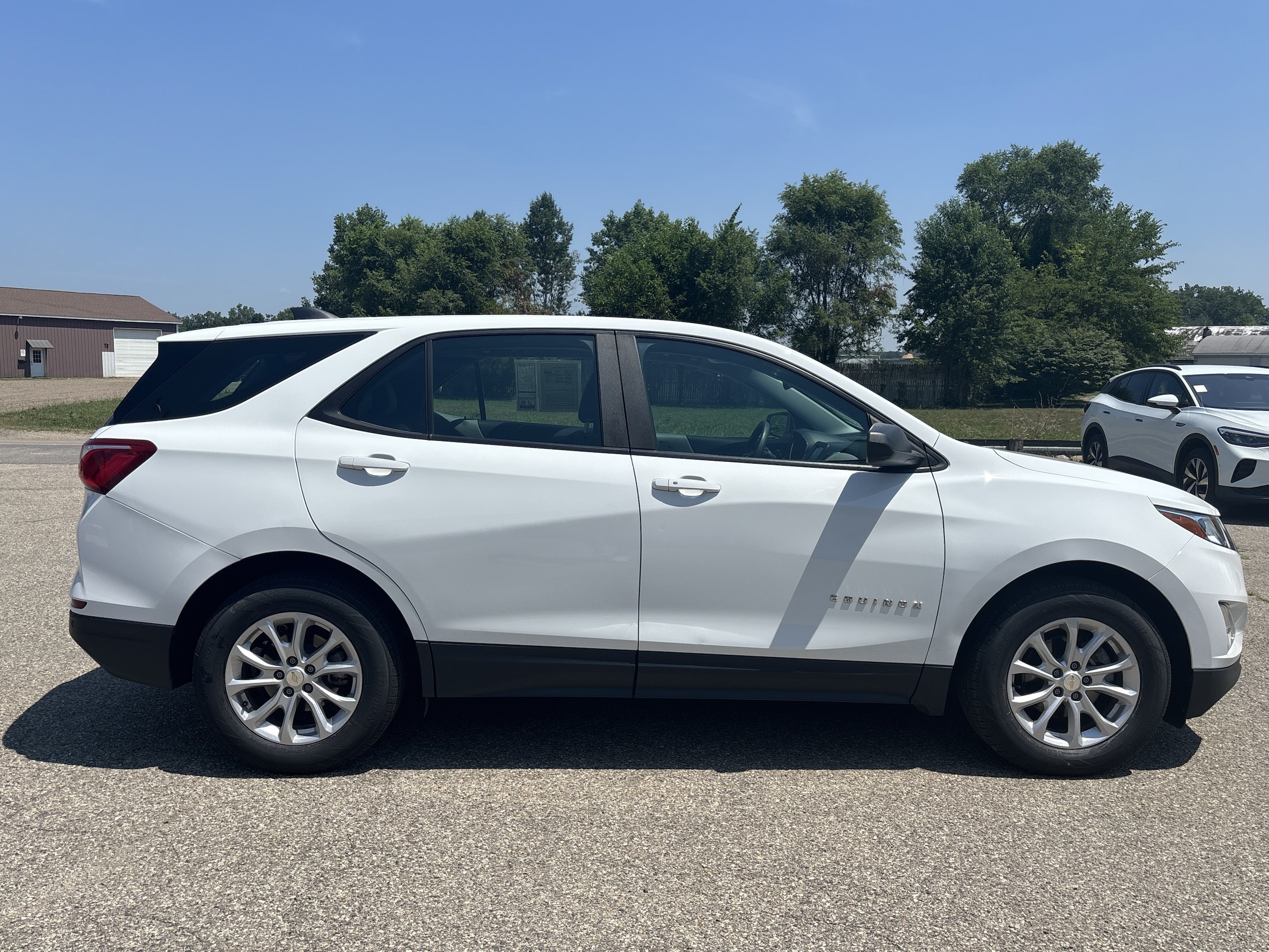 Used 2021 Chevrolet Equinox 1FL with VIN 3GNAXFEV2MS173371 for sale in Wayland, MI