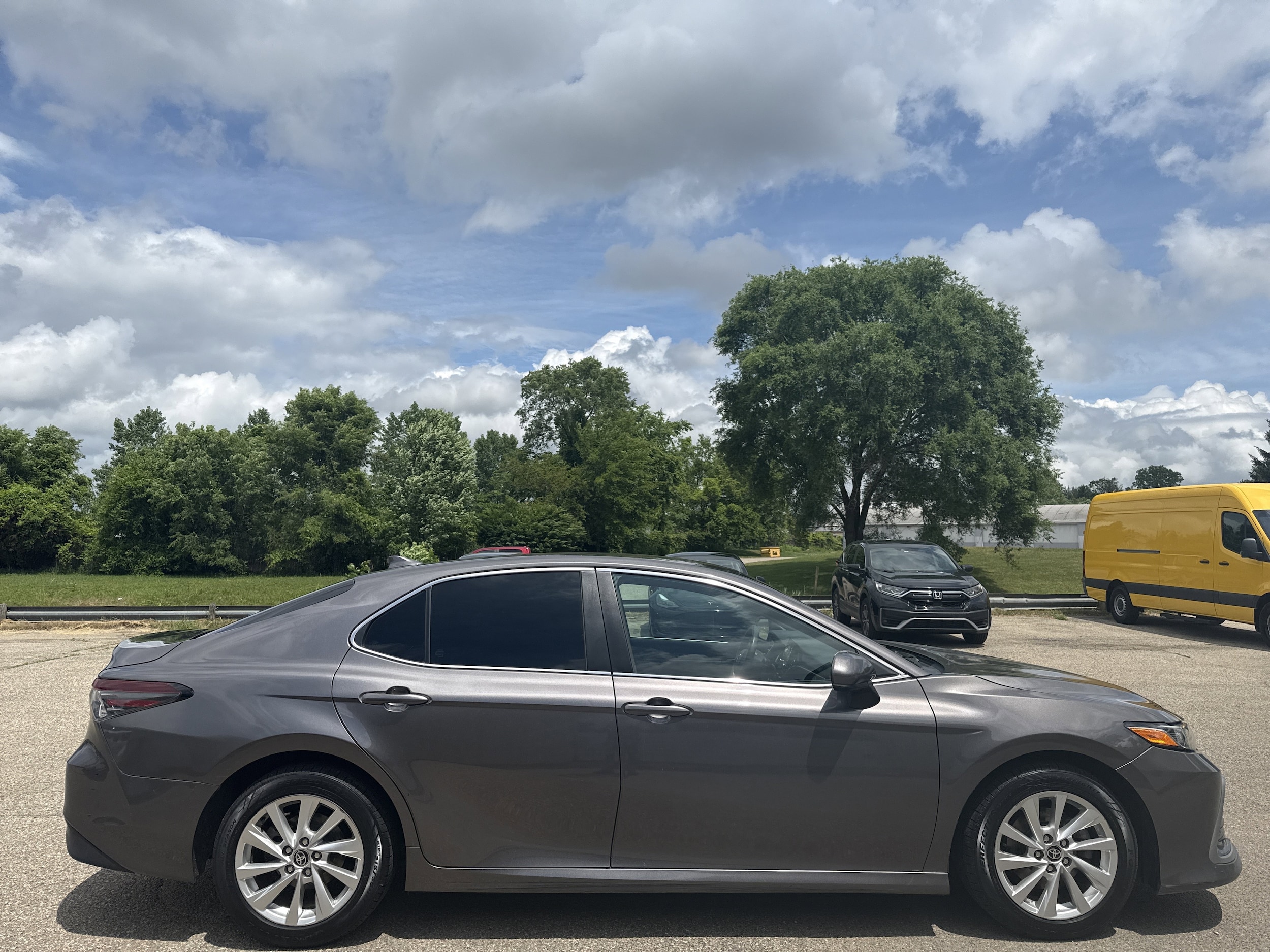 Used 2021 Toyota Camry LE with VIN 4T1C11AK2MU435242 for sale in Wayland, MI