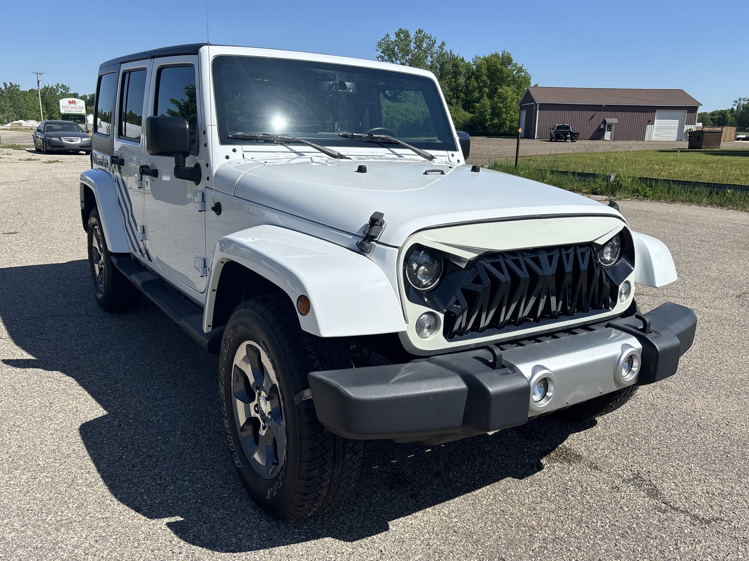 Used 2017 Jeep Wrangler Unlimited Sahara with VIN 1C4BJWEG3HL614114 for sale in Wayland, MI