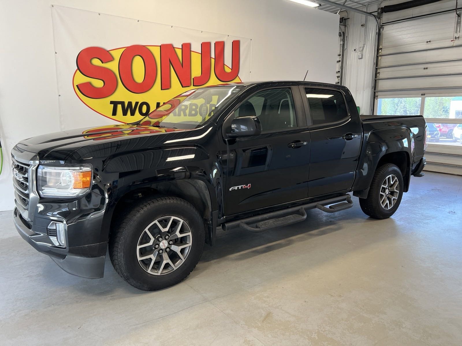 Certified 2021 GMC Canyon AT4 with VIN 1GTP6FE18M1174271 for sale in Two Harbors, Minnesota