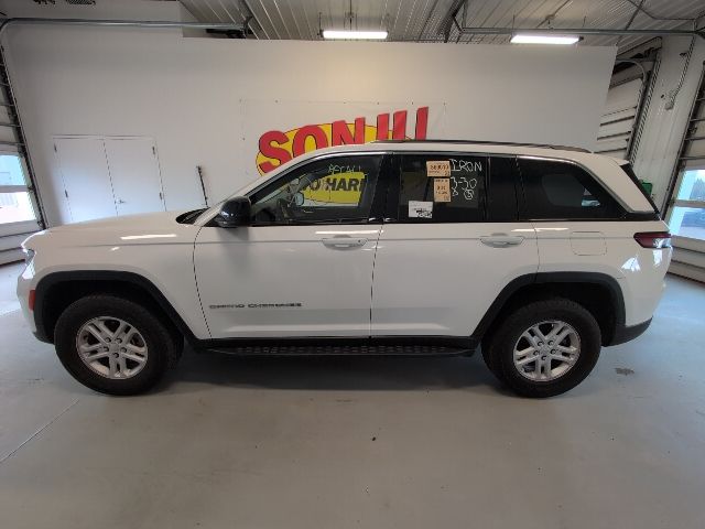 Certified 2023 Jeep Grand Cherokee Laredo with VIN 1C4RJHAG2PC640380 for sale in Two Harbors, Minnesota