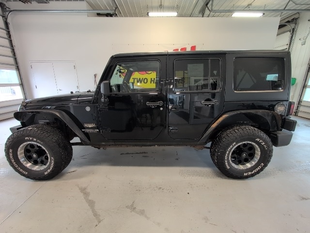 Used 2014 Jeep Wrangler Unlimited Sahara with VIN 1C4BJWEG9EL173732 for sale in Two Harbors, Minnesota