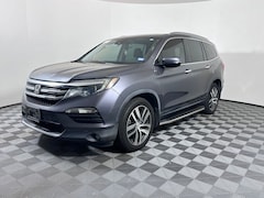 Used 2016 Honda Pilot Touring SUV serving Houston