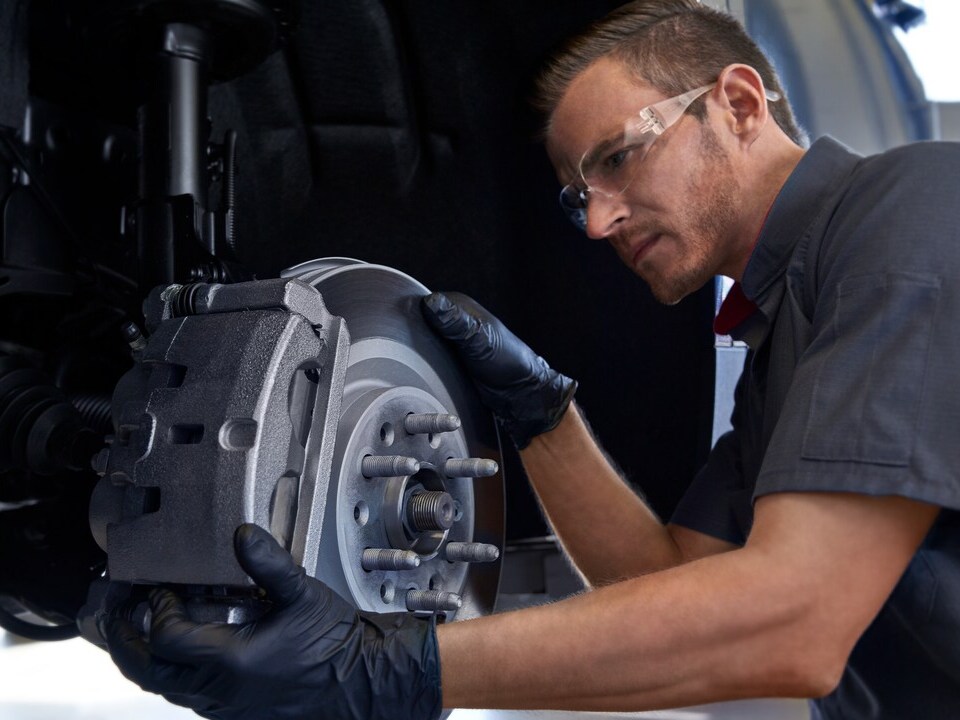 Man in front of a car