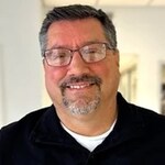 Staff member John Storms from ID_e354db