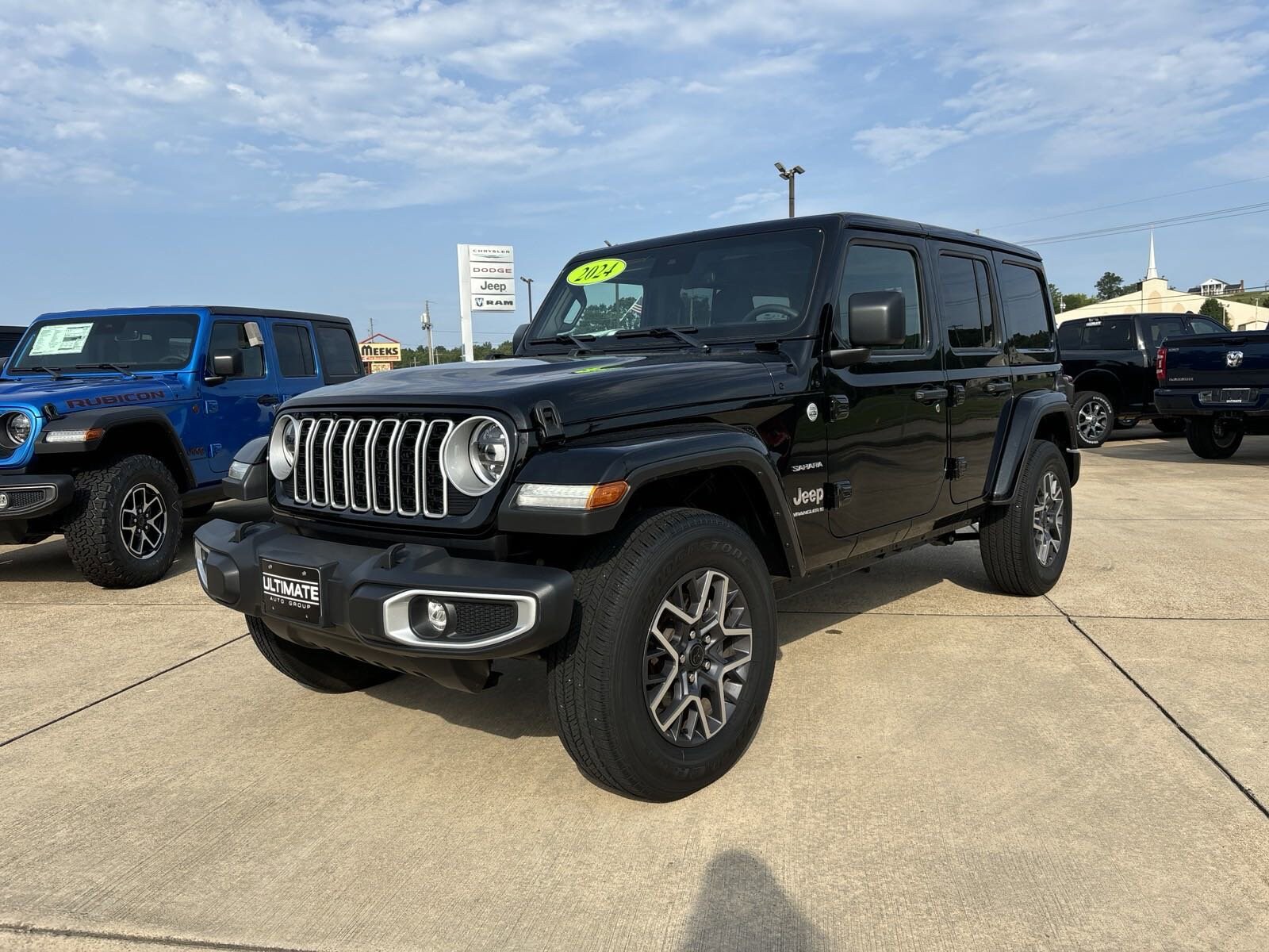 Used 2024 Jeep Wrangler 4-Door Sahara with VIN 1C4PJXEN1RW156194 for sale in Mountain Home, AR