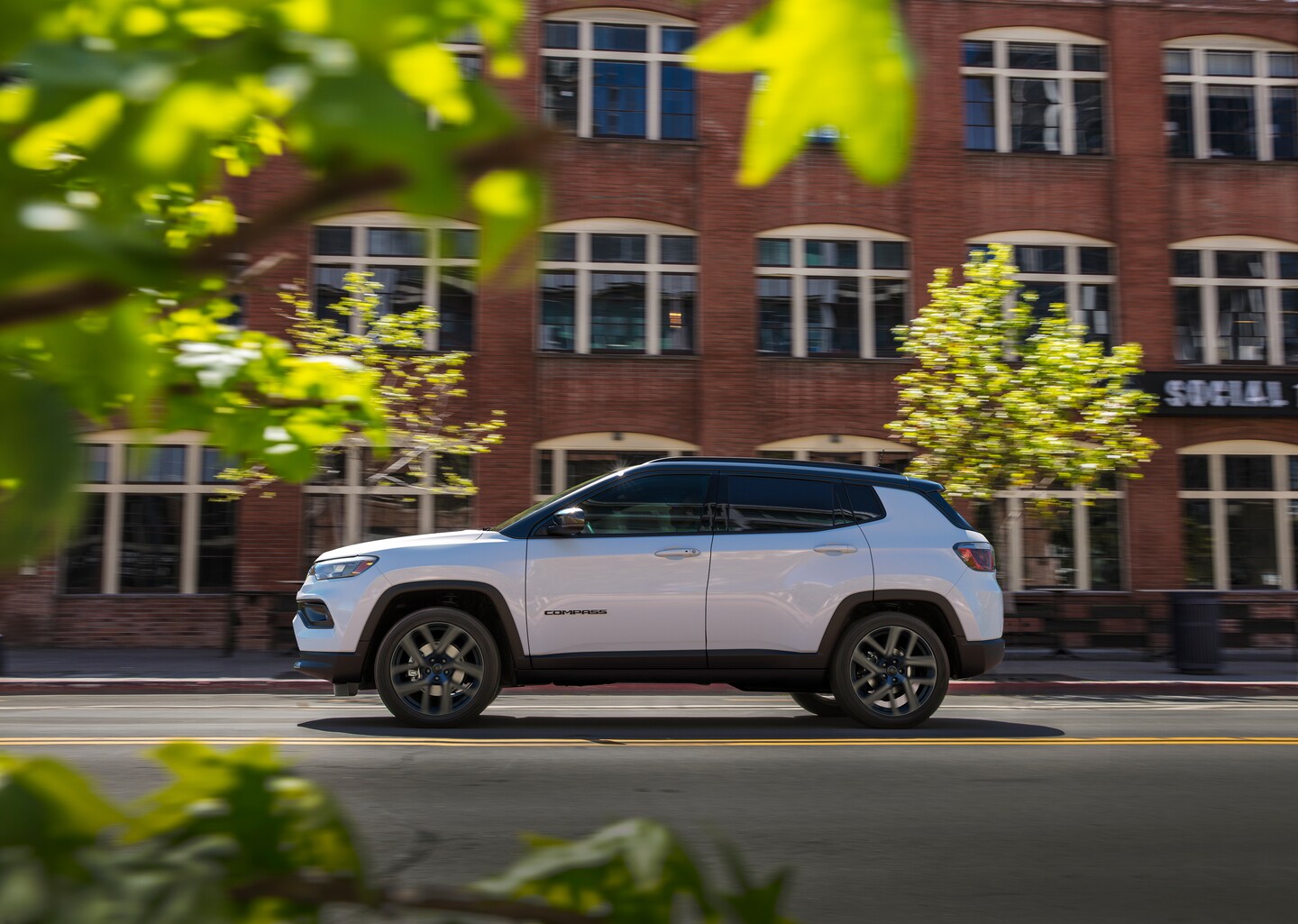 Jeep Compass on winding dirt path