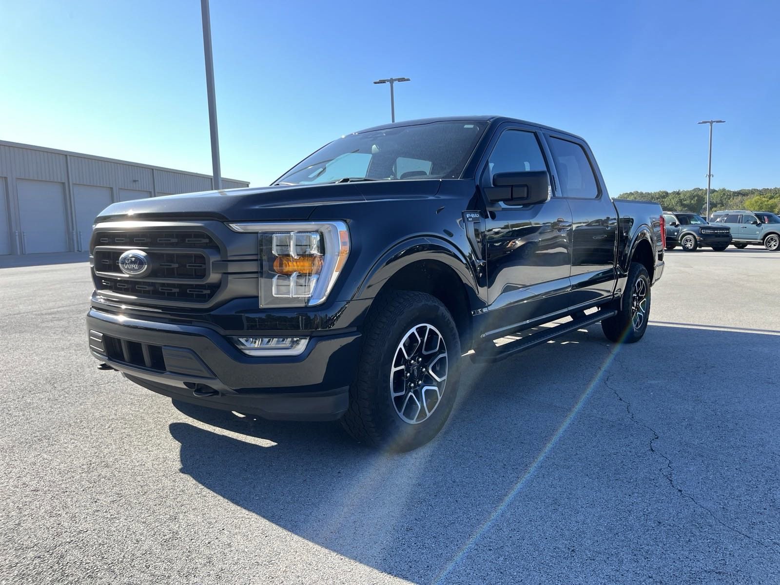 Used 2023 Ford F-150 XLT with VIN 1FTEW1EP6PFA20003 for sale in Mountain Home, AR