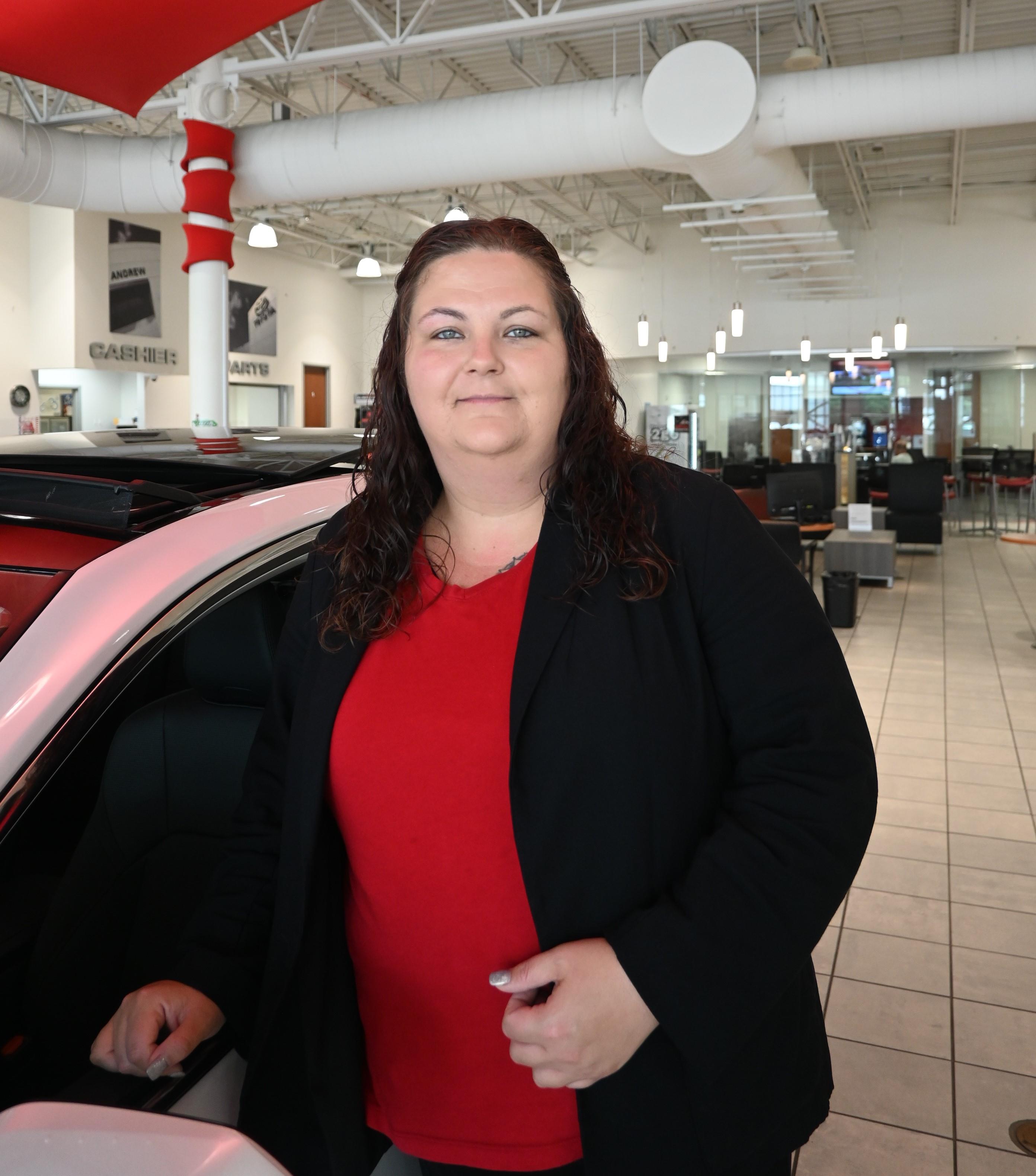 Staff member Lizzy Vasquez from 641234b90437