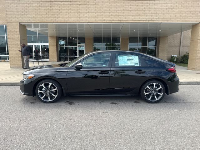 2026 Honda Civic Sport Touring Hybrid CVT's photo