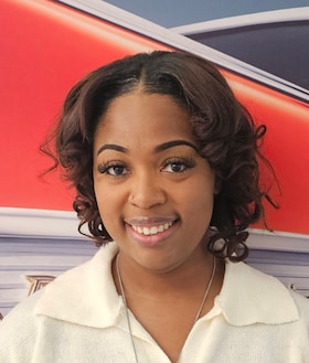 Staff member JADA SHERRIL from e1c8f83af1b9