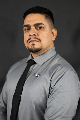 Staff member Justin Salazar from b328f9e6610c