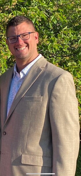 Staff member Brian Enos from ID_32db46765b0d