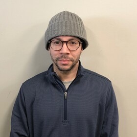 Staff member Andrew  from ID_90d4b114e632