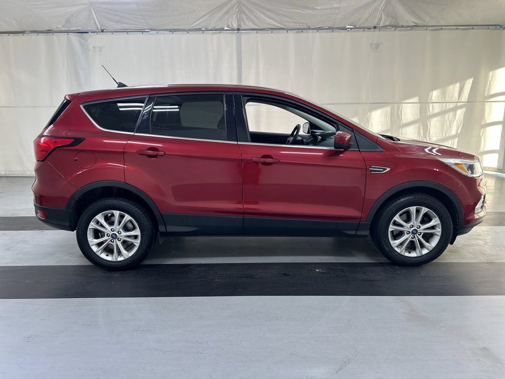 Used 2019 Ford Escape SE with VIN 1FMCU9GD2KUA09448 for sale in Cicero, NY