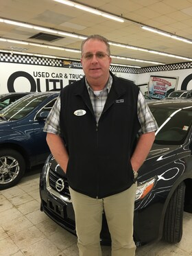 Staff member Mark Topor from f8e74b54bec5