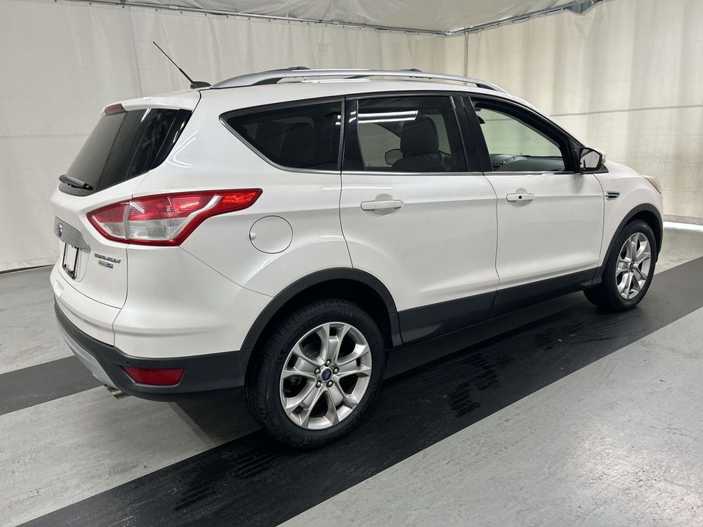 Used 2014 Ford Escape Titanium with VIN 1FMCU9J91EUC18897 for sale in Cicero, NY